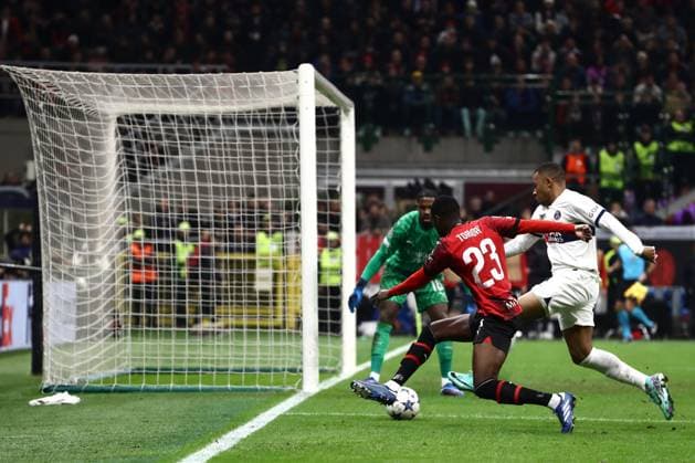 Milan, Italy, 7th November 2023. Mike Maignan of AC Milan looks on as team mate Fikayo Tomori denies Kylian Mbappe of PSG a scoring opportunity during the UEFA Champions League match at Giuseppe Meazza, Milan. Picture credit should read: Jonathan Moscrop Sportimage EDITORIAL USE ONLY. No use with unauthorised audio, video, data, fixture lists, club league logos or live services. Online in-match use limited to 120 images, no video emulation. No use in betting, games or single club league player publications. SPI-2699-0043