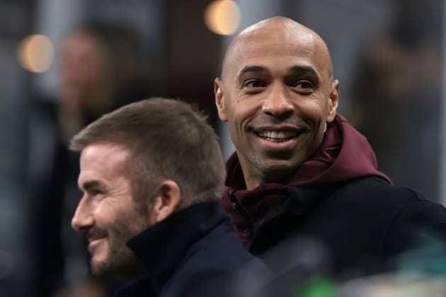 Milan, Italy, 7th November 2023. Former England, Manchester United, ManU LA Galaxy and PSG player and actual President and Co Owner of Inter Miami David Beckham reacts with Former Arsenal and France striker Thierry Henry prior to kick off in the UEFA Champions League match at Giuseppe Meazza, Milan. Picture credit should read: Jonathan Moscrop Sportimage EDITORIAL USE ONLY. No use with unauthorised audio, video, data, fixture lists, club league logos or live services. Online in-match use limited to 120 images, no video emulation. No use in betting, games or single club league player publications. SPI-2699-0069