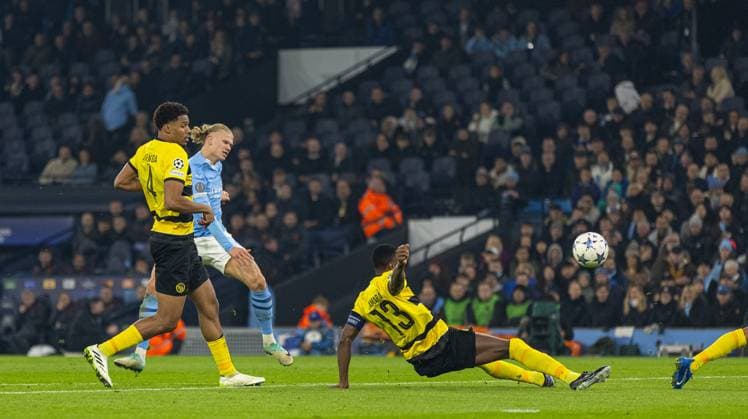 (231108) -- MANCHESTER, Nov. 8, 2023 -- Manchester City s Erling Haaland (2nd L) shoots to score during the UEFA Champions League Group G match between Manchester City FC and BSC Young Boys in Manchester, Britain, on Nov. 7, 2023. (SP)BRITAIN-MANCHESTER-FOOTBALL-UEFA CHAMPIONS LEAGUE-MANCHESTER CITY VS BSC YOUNG BOYS XinxHua 