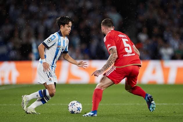 November 8, 2023: Takefusa Kubo of Real Sociedad competes for the ball with Felipe Rodrigues da Silva Morato of SL Benfica during the UEFA Champions League match between Real Sociedad and SL Benfica at Reale Arena on November 8, 2023, in San Sebastian, Spain. - ZUMAa181 20231108_zaa_a181_017 Copyright: xRicardoxLarreinax