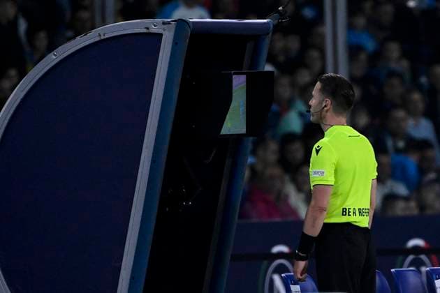 Referee Danny Makkelie checks the VAR during the Champions League Group C football match between SSC Napoli and FC Union Berlin at Diego Armando Maradona stadium in Naples (Italy), November 8th, 2023. AndreaxStaccioli