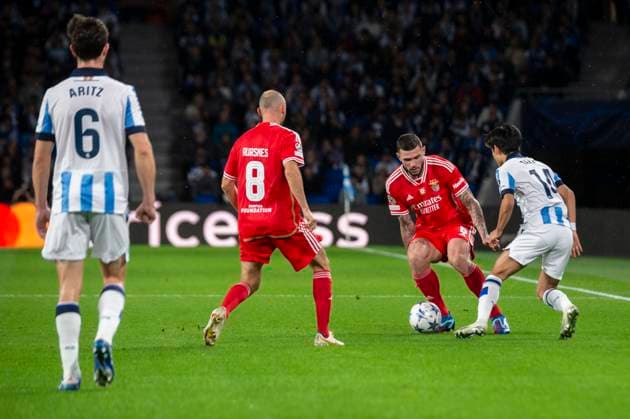 Real Sociedad Vs Benfica: Group D - UEFA Champions League Morato and Fredrik Aursnes of SL Benfica vie with Takefusa Kubo of Real Sociedad during the UEFA Champions League match between Real Sociedad and Benfica at Reale Arena. Donostia (Basque Country). November 08, 2023. (Gari Garaialde Bostok Photo) Donostia Gipuzkoa Spain Editorial Use Only  Copyright: xGarikoitzxGaraialdex Bostok Photo GarixGaraialdex GG2311080423