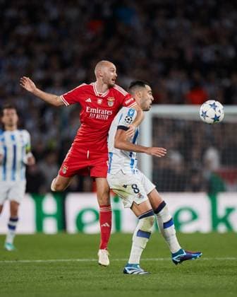 November 8, 2023: Fredrik Aursnes of SL Benfica competes for the ball with Mikel Merino of Real Sociedad during the UEFA Champions League match between Real Sociedad and SL Benfica at Reale Arena on November 8, 2023, in San Sebastian, Spain. - ZUMAa181 20231108_zaa_a181_038 Copyright: xRicardoxLarreinax