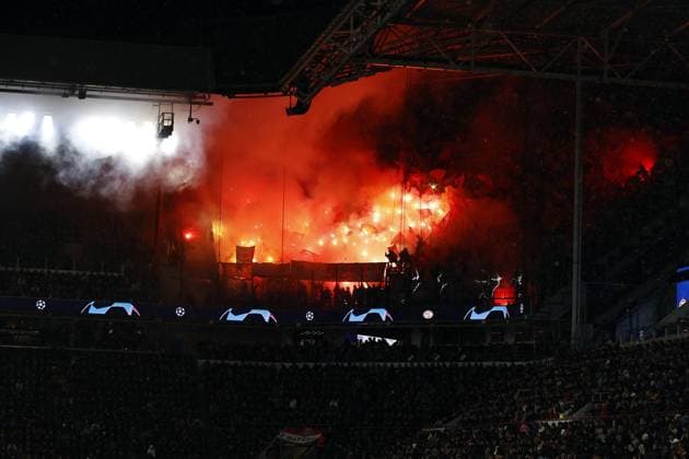 EINDHOVEN - Supporters of RC Lens set off fireworks during the UEFA Champions League group B match between PSV Eindhoven and RC Lens at the Phillips stadium on November 8, 2023 in Eindhoven, Netherlands. ANP MAURICE VAN STEEN UEFA Champions League 2023 24 2023 2024 xVIxANPxSportx xxANPxIVx 483356653 originalFilename: 483356653.jpg