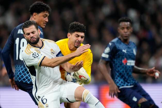 Nacho Fernandez of Real Madrid CF and Matheus Lima of SC Braga during Real Madrid vs SC Braga Champions League match on November 08, 2023 at Santiago Bernabeu Stadium in Madrid, Spain. Photo: Senis Cebolla ALFAQUI Madrid Santiago Bernabeu Stadium Spain Copyright: xSenisx xCebollax xALFAQUIx