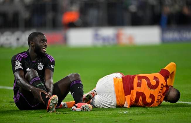 after duel Dayot Upamecano FC Bayern Muenchen FCB 02 vs Hakim Ziyech Galatasaray Istanbul 22 injured Injury FC Bayern Muenchen FCB vs Galatasaray Istanbul Group stage 4 Matchday 08 11 2023 DFL REGULATIONS PROHIBIT ANY USE OF PHOTOGRAPHS AS IMAGE SEQUENCES AND OR QUASI VIDEO FC Bayern Muenchen FCB vs Galatasaray Istanbul