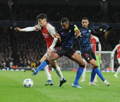 Football - 2023 2024 UEFA Champions League - Group B - Matchday Four Six - Arsenal vs Sevilla - Emirates Stadium - Wednesday 8th November 2023 Kai Havertz of Arsenal is challenged by Fernando 
