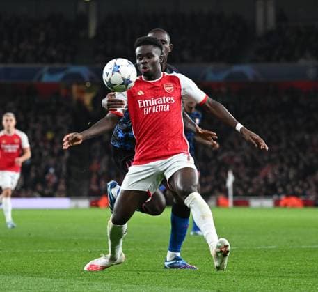 Arsenal v Sevilla UEFA Champions League Bukayo Saka of Arsenal and Tanguy Nianzou of Sevilla battle for the ball during the UEFA Champions League Group B match at the Emirates Stadium, London Copyright: xNigelxBramleyx FIL-19220-0062 UK Newspapers OUT