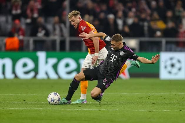 Germany, Muenchen, 08 11 2023, Allianz Arena, FC Bayern Muenchen vs Galatasaray UEFA Champions League 2023 2024 Group A, Baris Alper Yilmaz Galatasaray A S and Joshua Kimmich FC Bayern Muenchen battle for the ball Munich Allianz Arena Germany  eu-images-048
