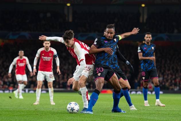 8th November 2023; Emirates Stadium, London, England; Champions League Football, Group Stage, Arsenal versus Sevilla; Kai Havertz of Arsenal and Fernando of Sevilla challenge for the ball  ActionPlus12573932 SalvioxCalabrese