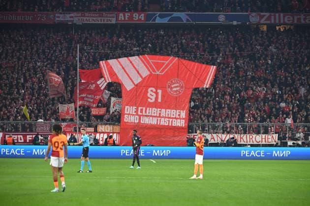 Fan protest, with giant jersey PARAGRAPH 1 DIE CLUBFARBEN SIND UNANTASTBAR, protest against the black away jersey at home matches Football Champions League group stage 4 matchday FC Bayern Muenchen Galatasaray Istanbul 2 1 on 08 11 2023, A L L I A N Z A R E N A