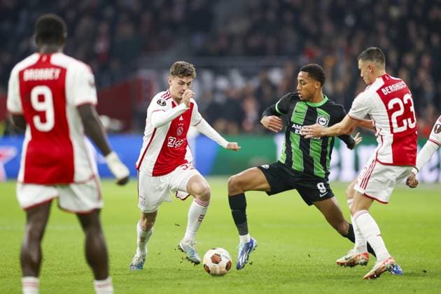 AMSTERDAM, 09-11-2023 JohanCruyff Arena, Europa League Football season 2023 2024. Ajax player Benjamin Tahirovic and Brighton player Joao Pedro during the match between Ajax and Brighton & Hove Albion Ajax - Brighton  x23103513x Copyright: