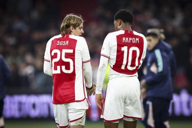 AMSTERDAM, 09-11-2023 JohanCruyff Arena, Europa League Football season 2023 2024. Ajax player Borna Sosa and Ajax player Chuba Akpom after the match between Ajax and Brighton & Hove Albion Ajax - Brighton  x23103705x Copyright: