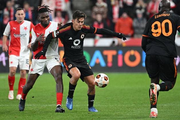 From right Paulo Dybala of Rome, Igoh Ogbu, Jan Boril, both of Slavia in action during the football Europe League 4th round match Slavia Praha vs AS Rome, group G in Prague, Czech Republic, November 9, 2023. (CTKxPhoto MichalxKamaryt) CTKPhotoP2023110909761  CTKPhotoP2023110909761