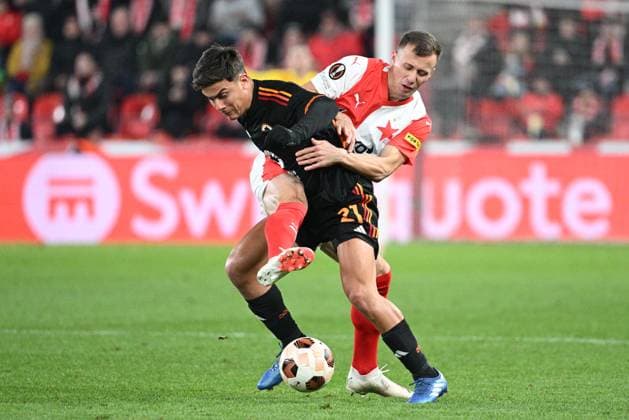 From left Paulo Dybala of Rome and Tomas Vlcek of Slavia in action during the football Europe League 4th round match Slavia Praha vs AS Rome, group G in Prague, Czech Republic, November 9, 2023. (CTKxPhoto MichalxKamaryt) CTKPhotoP2023110909814  CTKPhotoP2023110909814