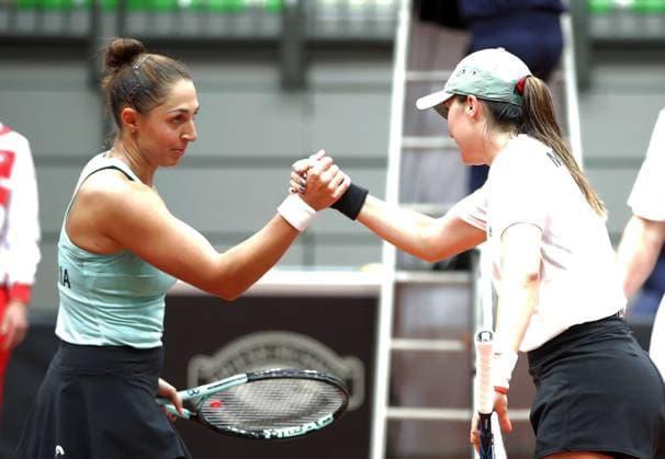 TENNIS - Billie Jean King Cup, AUT vs MEX SCHWECHAT,AUSTRIA,11.NOV.23 - TENNIS - Billie Jean King Cup, play off, Austria vs Mexico. Image shows Tamira Paszek (AUT) and Fernanda Contreras Gomez (MEX).  GEPAxpictures xWalterxLuger