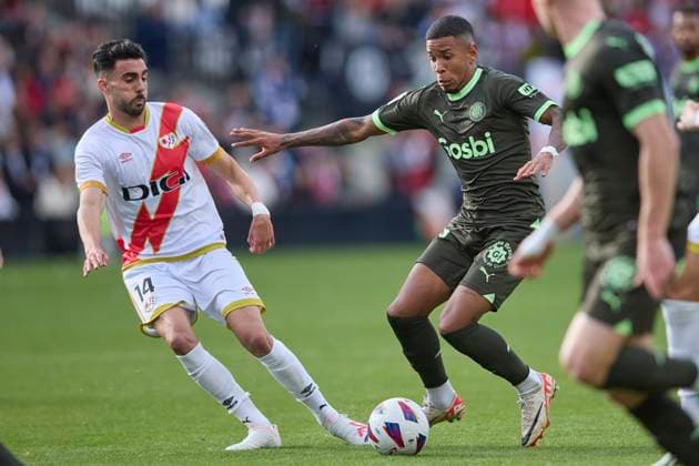 Spain, Madrid, 11 11 2023, Santiago Bernabeu Stadium, Real Madrid v Valencia CF La Liga EA Sports match round 13, Savio Moreira Girona FC and Kike Perez Rayo Vallecano battle for the ball Madrid Santiago Bernabeu Stadium Spain  eu-images-071