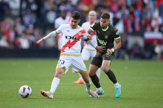 Spain, Madrid, 11 11 2023, Santiago Bernabeu Stadium, Real Madrid v Valencia CF La Liga EA Sports match round 13, Oscar Valentin Rayo Vallecano and Cristian Portu Girona FC battle for the ball Madrid Santiago Bernabeu Stadium Spain  eu-images-071