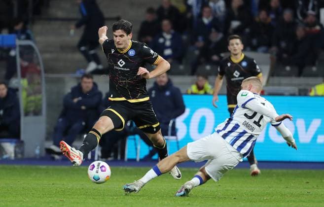 Igor Matanovic, Marton Dardai duel Match scene Action Sport Football Soccer DFL 2 Bundesliga Men 13 Matchday Season 2023 2024 11 11 2023 Hertha BSC Berlin vs Karlsruher SC KSC DFL regulations prohibit any use of photographs as image sequences and or quasi video