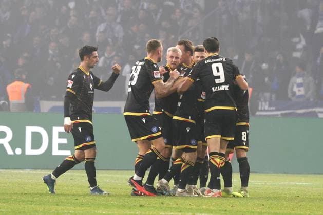 DEU, DFL, 2 FBL, Hertha BSC vs Karlsruher SC, 11 11 2023, Berliner Olympiastadion, Berlin, DEU, DFL, 2 FBL, Hertha BSC vs Karlsruher SC, in the picture after the 2 2 by Leon Jensen Karlsruher SC 6 , Karlsruher player, Lars Stindel Karlsruher SC 13 DFL regulations prohibit any use of Photographs as image sequences and or quasi video Foto Juergen Engler nordphoto GmbH nordphotoxGmbHx xEngler nph00076