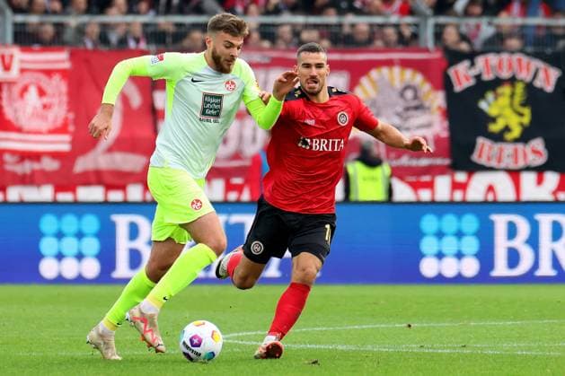 Wiesbaden, Germany 12 November 2023 2 BL 2023 2024 SV Wehen Wiesbaden vs 1 FC Kaiserslautern In picture from left in duel Julian Niehues Kaiserslautern vs Ivan Prtajin Wiesbaden DFL regulations prohibit any use of photographs as image sequences and or quasi video Britta Arena Hessen Copyright: xFotostandx xRacochax