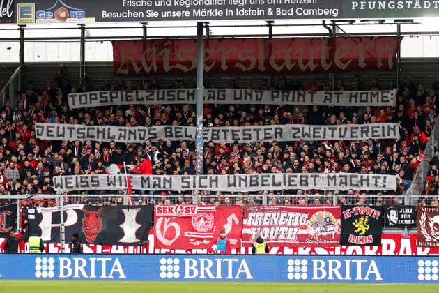12 11 2023, xavx, Soccer 2 Bundesliga, SV Wehen Wiesbaden 1 FC Kaiserslautern emspor, v l spectators, Fans of 1 FC Kaiserslautern show a banner against too high ticket prices DFL DFB REGULATIONS PROHIBIT ANY USE OF PHOTOGRAPHS as IMAGE SEQUENCES and or QUASI VIDEO Wiesbaden