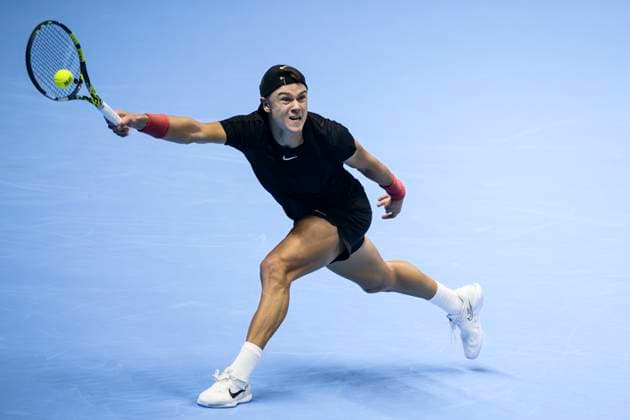 Nitto ATP, Tennis Herren Finals - Day One Holger Rune of Denmark plays a forehand during the round robin singles match against Novak Djokovic of Serbia during day one of the Nitto ATP Finals. Novak Djokovic won 7-6(4), 6-7(1), 6-3. Turin Italy Copyright: xNicolòxCampox
