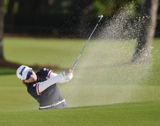 Golf: Annika Japan s Minami Katsu hits out of a bunker on the 14th hole during the final round of the Annika golf tournament on Nov. 12, 2023, at Pelican Golf Club in Belleair, Florida.  A14AA0002128912P