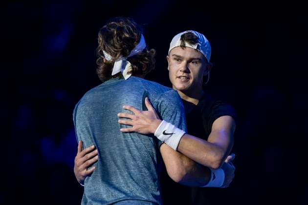 Nitto ATP, Tennis Herren Finals - Day Three Holger Rune of Denmark hugs Stefanos Tsitsipas of Greece at the end of the round robin singles match during day three of the Nitto ATP Finals. Turin Italy Copyright: xNicolòxCampox