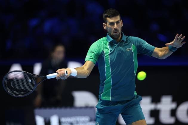 (231115) -- TURIN, Nov. 15, 2023 -- Novak Djokovic hits a return during the group stage match between Novak Djokovic of Serbia and Jannik Sinner of Italy at ATP, Tennis Herren Finals tennis tournament in Turin, Italy, Nov. 14, 2023. (Photo by Xinhua) (SP)ITALY-TURIN-TENNIS-ATP FINALS AlbertoxLingria 