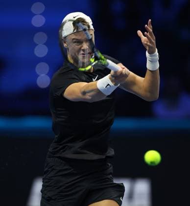 (231115) -- TURIN, Nov. 15, 2023 -- Holger Rune hits a return during the group stage match between Stefanos Tsitsipas of Greece and Holger Rune of Denmark at ATP, Tennis Herren Finals tennis tournament in Turin, Italy, on Nov. 14, 2023. (Photo by Xinhua) (SP)ITALY-TURIN-TENNIS-ATP FINALS AlbertoxLingria 