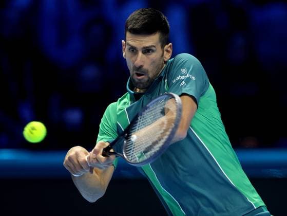 (231115) -- TURIN, Nov. 15, 2023 -- Novak Djokovic hits a return during the group stage match between Novak Djokovic of Serbia and Jannik Sinner of Italy at ATP, Tennis Herren Finals tennis tournament in Turin, Italy, Nov. 14, 2023. (Photo by Xinhua) (SP)ITALY-TURIN-TENNIS-ATP FINALS AlbertoxLingria 