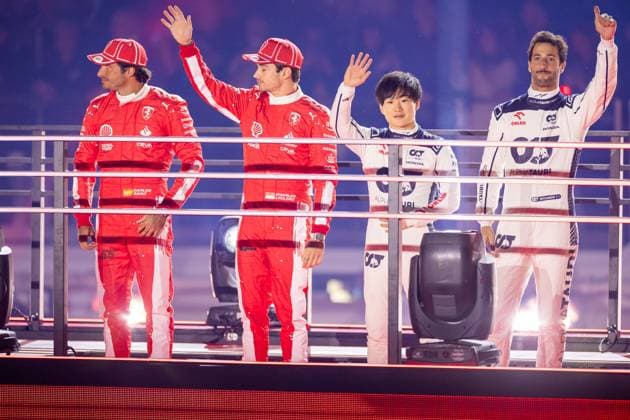 LAS VEGAS, NV - NOVEMBER 15: Ferrari driver Carlos Sainz (55) of Spain and Ferrari driver Charles Leclerc (16) of Monaco stand with AlphaTauri driver Yuki Tsunoda (22) of Japan and AlphaTauri driver Daniel Ricciardo (3) of Australia during the opening ceremony of the F1 Las Vegas Grand Prix on Wednesday, November 15 on the Las Vegas Street Circuit in Las Vegas, NV. (Photo by Bob Kupbens Icon Sportswire) AUTO: NOV 15 F1 Las Vegas Grand Prix EDITORIAL USE ONLY Icon231115033