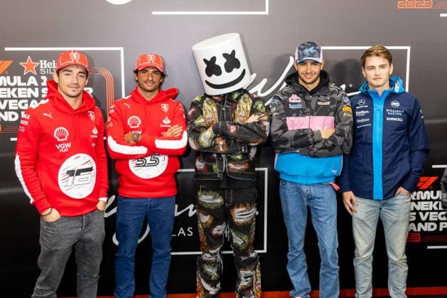 LAS VEGAS, NV - NOVEMBER 15: Ferrari driver Charles Leclerc (16) of Monaco, Ferrari driver Carlos Sainz (55) of Spain, Alpine driver Esteban Ocon (31) of France and Williams driver Logan Sargeant (2) of the United States pose with Marshmello during the red carpet event before the F1 Las Vegas Grand Prix on Wednesday, November 15 on the Las Vegas Street Circuit in Las Vegas, NV. (Photo by Bob Kupbens Icon Sportswire) AUTO: NOV 15 F1 Las Vegas Grand Prix EDITORIAL USE ONLY Icon231116043
