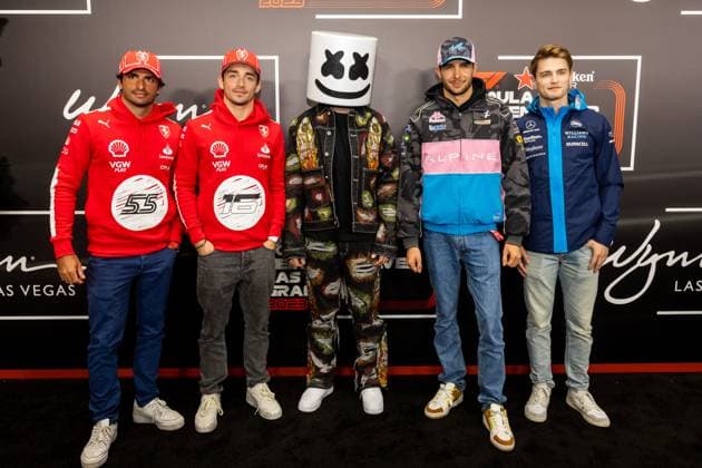 LAS VEGAS, NV - NOVEMBER 15: Ferrari driver Charles Leclerc (16) of Monaco, Ferrari driver Carlos Sainz (55) of Spain, Alpine driver Esteban Ocon (31) of France and Williams driver Logan Sargeant (2) of the United States pose with Marshmello during the red carpet event before the F1 Las Vegas Grand Prix on Wednesday, November 15 on the Las Vegas Street Circuit in Las Vegas, NV. (Photo by Bob Kupbens Icon Sportswire) AUTO: NOV 15 F1 Las Vegas Grand Prix EDITORIAL USE ONLY Icon231116044