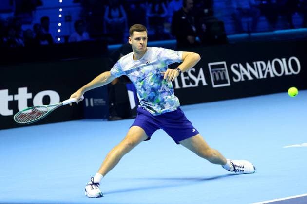 (231117) -- TURIN, Nov. 17, 2023 -- Hubert Hurkacz hits a return during the group stage match between Novak Djokovic of Serbia and Hubert Hurkacz of Poland at ATP, Tennis Herren Finals tennis tournament in Turin, Italy, Nov. 16, 2023. (Photo by Xinhua) (SP)ITALY-TURIN-TENNIS-ATP FINALS AlbertoxLingria 