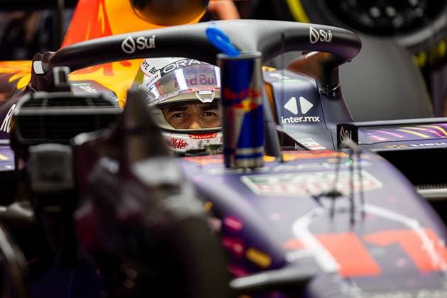 LAS VEGAS, NV - NOVEMBER 16: Red Bull Racing driver Sergio Perez (11) of Mexico waits as his car is adjusted during P2 practice at the F1 Las Vegas Grand Prix on Thursday, November 16 on the Las Vegas Street Circuit in Las Vegas, NV. (Photo by Bob Kupbens Icon Sportswire) AUTO: NOV 16 F1 Las Vegas Grand Prix EDITORIAL USE ONLY Icon231117071