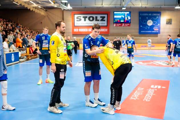 Goalkeeper Nils Conrad No 49, VfL Luebeck Schwartau , Lennart Leitz No 5, VfL Luebeck Schwartau and goalkeeper Paul Dreyer No 12, VfL Luebeck Schwartau are dejected disappointed VfL Luebeck Schwartau vs TSV Bayer Dormagen, Handball, 2 Bundesliga, 18 11 23 Luebeck Schleswig Holstein Germany Copyright: xAgentur54Gradx xFelixxKoenigx