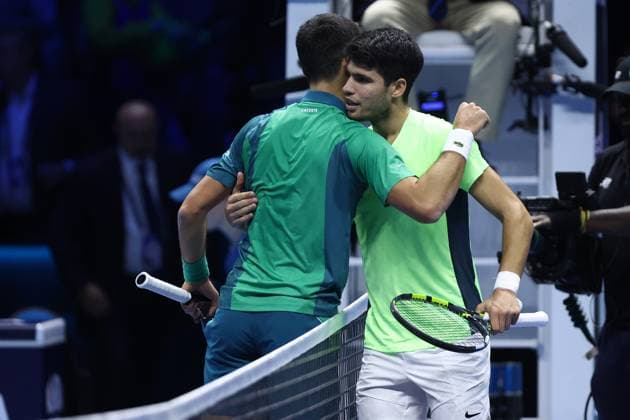 Novak Djokovic vs Carlos Alcaraz Novak Djokovic of Serbia (L) embraces Carlos Alcaraz of Spain (R) at the end of the semi-final singles match between Novak Djokovic of Serbia and Carlos Alcaraz of Spain on Day seven of the Nitto ATP, Tennis Herren World Tour Finals. Torino Pala Alpitour Italy Copyright: xMarcoxCanonierox