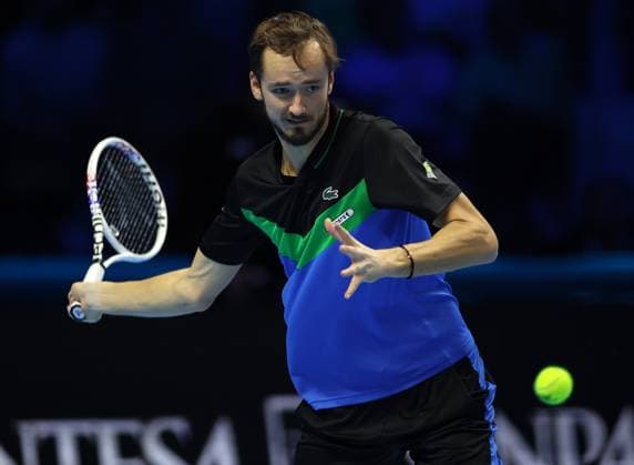 (231119) -- TURIN, Nov. 19, 2023 -- Daniil Medvedev hits a return during the semifinal match between Jannik Sinner of Italy and Daniil Medvedev of Russia at ATP, Tennis Herren Finals tennis tournament in Turin, Italy, Nov. 18, 2023. (Photo by Xinhua) (SP)ITALY-TURIN-TENNIS-ATP FINALS AlbertoxLingria 