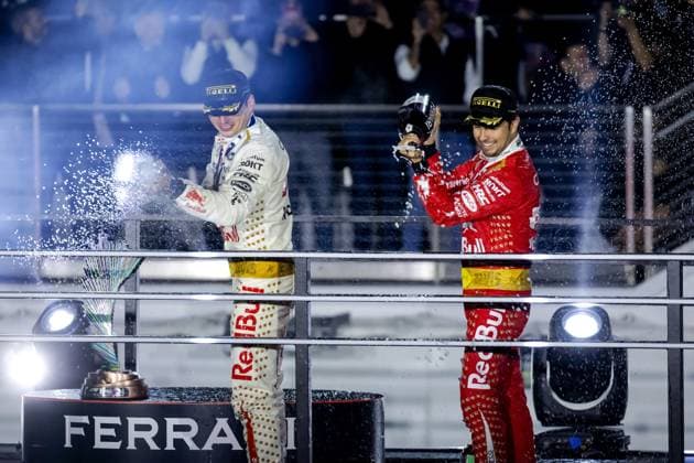 LAS VEGAS - Max Verstappen (Red Bull Racing) and Sergio Perez (Red Bull Racing) on the podium after the Las Vegas Formula 1 Grand Prix at the Las Vegas Strip Circuit in Nevada. ANP SEM VAN DER WAL F1 Grand Prix of Las Vegas 2022 23 xVIxANPxSportx xxANPxIVx 484234749 originalFilename: 484234749.jpg