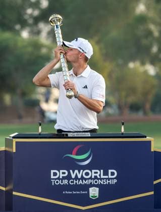 NICOLAI HoJGAARD of Denmark kisses the trophy after winning DP World Tour Championship in Dubai, United Arab Emirates, Nov 19, 2023. Dubai United Arab Emirates  Copyright: xMARTINxDOKOUPILx 441_4432