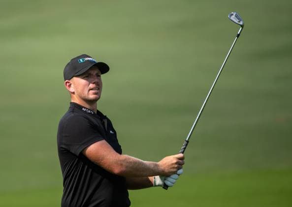 MATT WALLACE of England strikes the ball on the fifth fairway during DP World Tour Championship in Dubai, United Arab Emirates, Nov 19, 2023. Dubai United Arab Emirates  Copyright: xMARTINxDOKOUPILx 443_1717