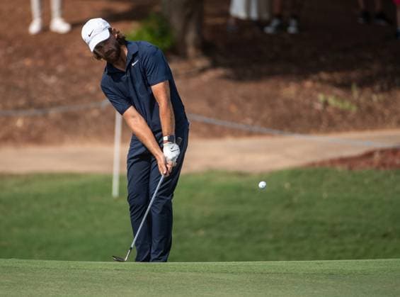 TOMMY FLEETWOOD of England strikes the ball to the fifth green during DP World Tour Championship in Dubai, United Arab Emirates, Nov 19, 2023. Dubai United Arab Emirates  Copyright: xMARTINxDOKOUPILx 443_1732