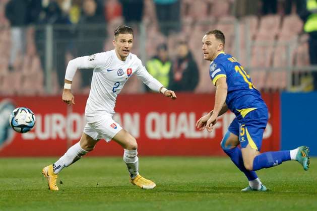 Bosnia and Herzegovina v Slovakia: Group J - UEFA EURO, EM, Europameisterschaft,Fussball 2024 European Qualifiers Peter Pekarik of Slovakia competes for the ball with Nemanja Bilbija of Bosnia and Herzegovina during the UEFA EURO 2024 European qualifier match between Bosnia and Herzegovina and Slovakia at Bilino Polje Stadium on November 18, 2023 in Zenica, Bosnia and Herzegovina. ArminxDurgut PIXSELL