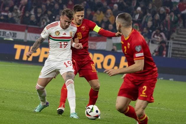 (231120) -- BUDAPEST, Nov. 20, 2023 -- Krisztofer Horvath (L) of Hungary vies with Stevan Jovetic (C) of Montenegro during the UEFA EURO, EM, Europameisterschaft,Fussball 2024 Group G qualification match between Hungary and Montenegro in Budapest, Hungary on Nov. 19, 2023. (Photo by Xinhua) (SP)HUNGARY-BUDAPEST-UEFA EURO2024-QUALIFIERS AttilaxVolgyi 