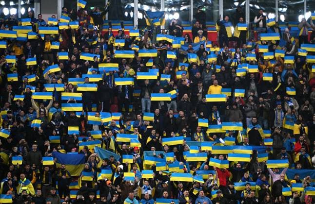 Football, Men, Qualification for the European Championship 2024, BayArena Leverkusen, Ukraine Italy 0 0 Ukrainian fans with their national colors Fan, Fans, Fan culture, Enthusiasm UEFA REGULATES PROHIBIT ANY USE OF PHOTOGRAPHS AS IMAGE SEQUENCES AND OR QUASI VIDEO