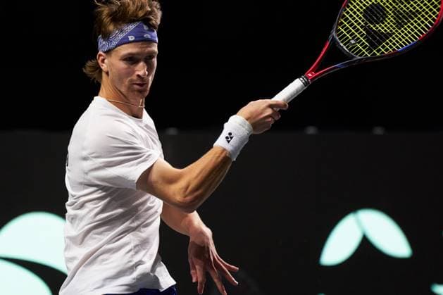 Patrick Kaukovalta of Finland in action against Milos Raonic of Canada during the Davis Cup Final 8 match between Canada and Finland at Palacio de Deportes Martin Carpena on November 21, 2023 in Malaga, Spain. (Photo by Camilla Stolen Imago) Malaga Spain Copyright: xCamillaxStolenx L1100839