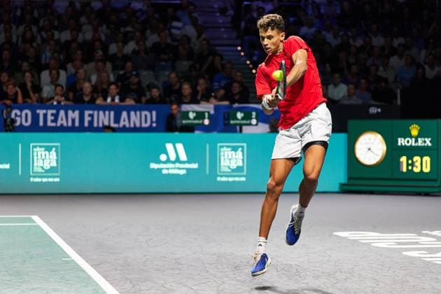 Gabriel Diallo of Canada returns a backhand to Otto Virtanen of Finland during the second Davis Cup Final 8 match between Canada and Finland at Palacio de Deportes Martin Carpena on November 21, 2023 in Malaga, Spain. (Photo by Camilla Stolen Imago) Malaga Spain Copyright: xCamillaxStolenx L1110680