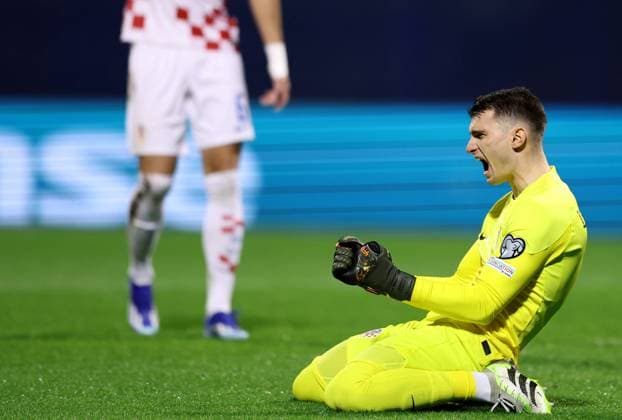 Croatia v Armenia: Group D - UEFA EURO, EM, Europameisterschaft,Fussball 2024 European Qualifiers Dominik Livakovic of Croatia celebrate after saving a goal during the UEFA EURO 2024 European qualifier match between Croatia and Armenia at Stadion Maksimir on November 21, 2023 in Zagreb, Croatia. GoranxStanzl PIXSELL